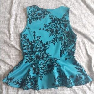 M teal shirt that flares out